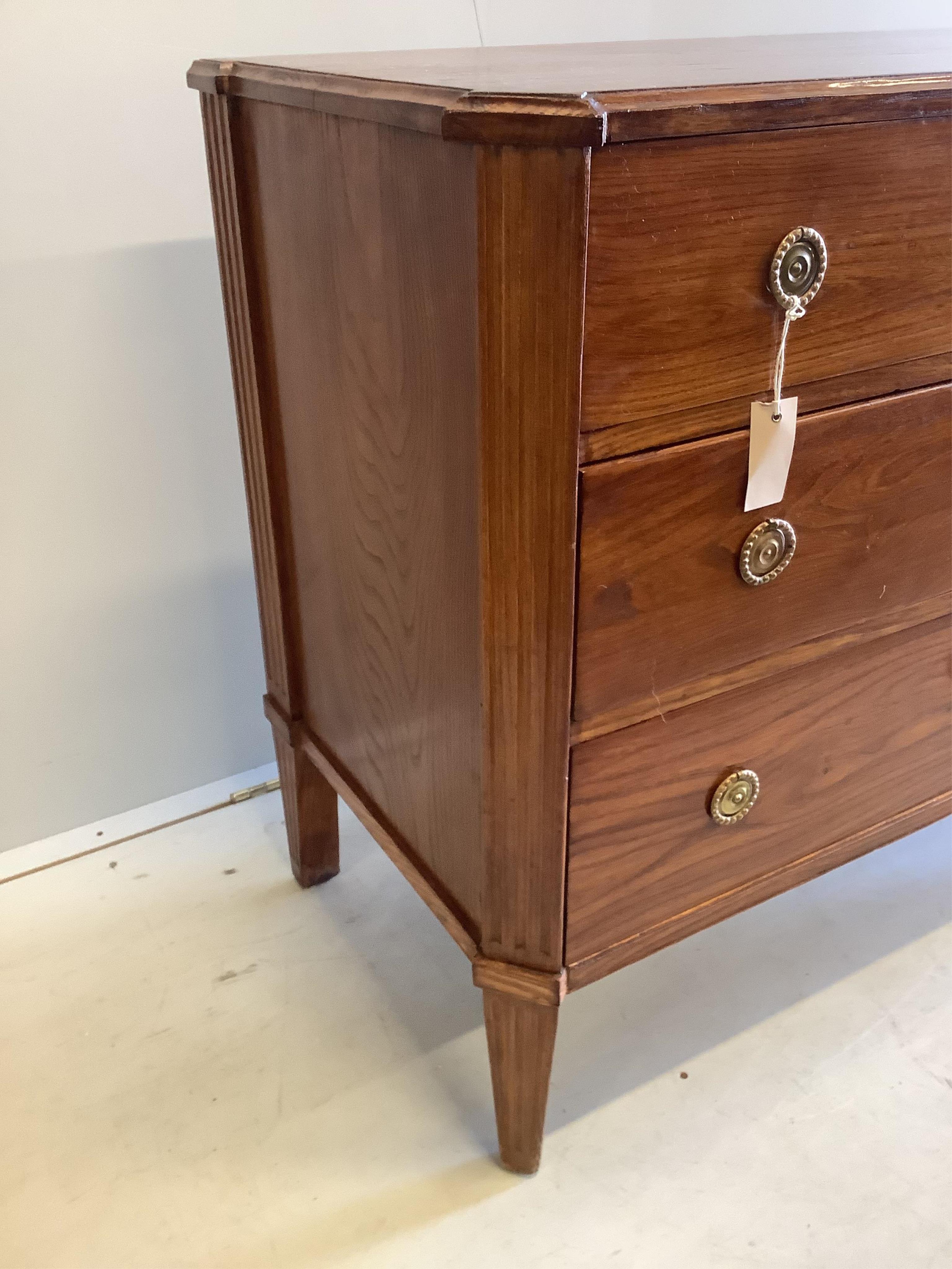 A 19th century Continental elm three drawer commode, width 99cm, depth 49cm, height 83cm. Condition - fair